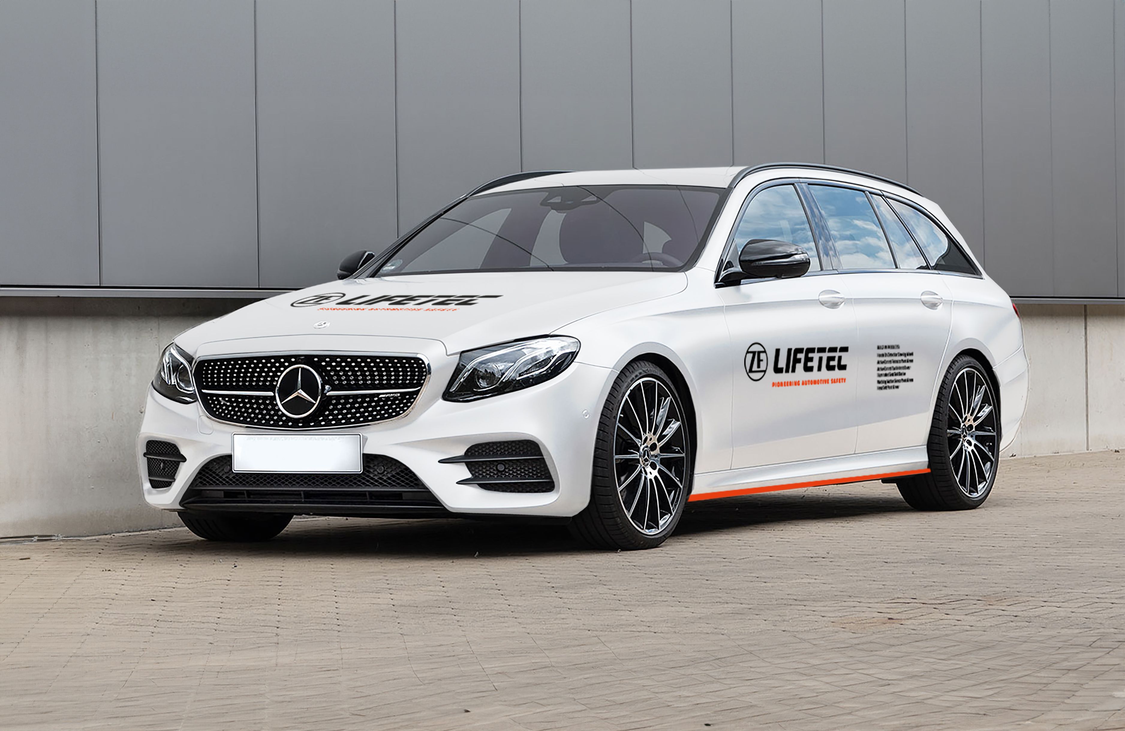 White demo car with ZF Lifetec logo 